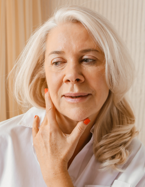 A woman around 50 to 60 years old at a private skin clinic