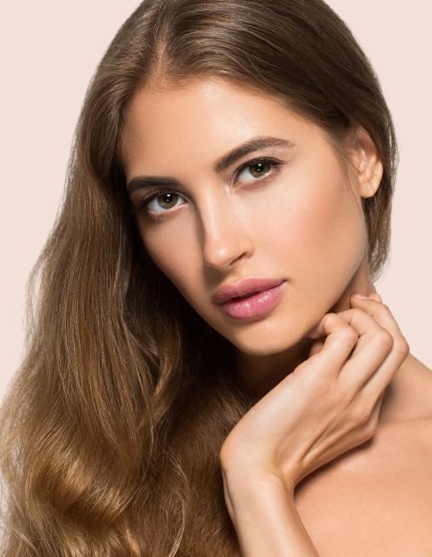 A woman with perfect skin from radio frequency skin tightening treatment